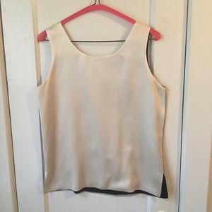 100% Silk shell. Reversible.